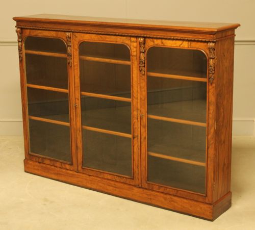 fig 2. A VICTORIAN WALNUT 3 DOOR BOOKCASE DISPLAY