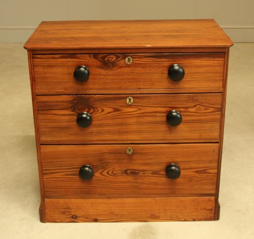 fig 1. A 19th century pitch pine chest of drawers