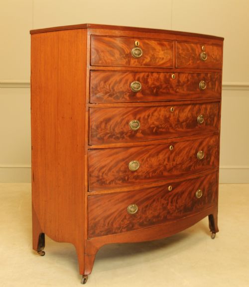 fig 1. A Regency mahogany bow fronted chest of drawers.