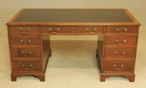 A Large Mahogany Twin Pedistal Desk