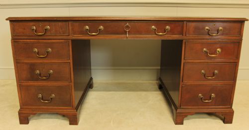 fig 1. A LARGE MAHOGANY TWIN PEDISTAL DESK