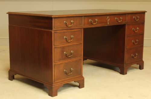 fig 2. A LARGE MAHOGANY TWIN PEDISTAL DESK