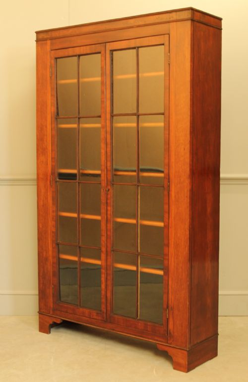 fig 1. A 19TH CENTURY MAHOGANY GLAZED BOOKCASE.