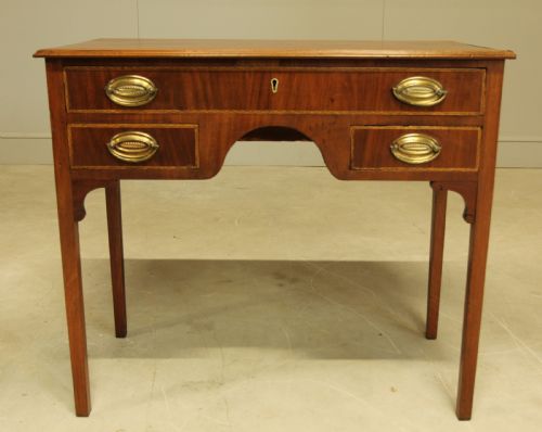 A 19th Century Mahogany Kneehole Side Table.