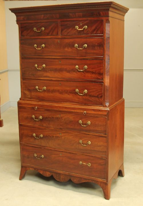 fig 2. A REGENCY MAHOGANY TALL BOY.