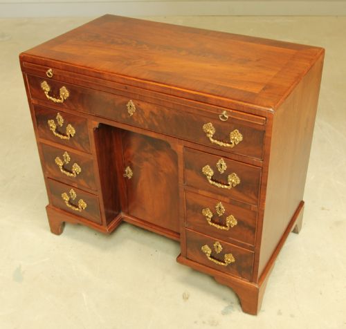 A GEORGE III CURL MAHOGANY KNEEHOLE DESK - ADDITIONAL PHOTO 5