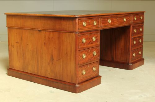 fig 3. A large Victorian mahogany partners desk.