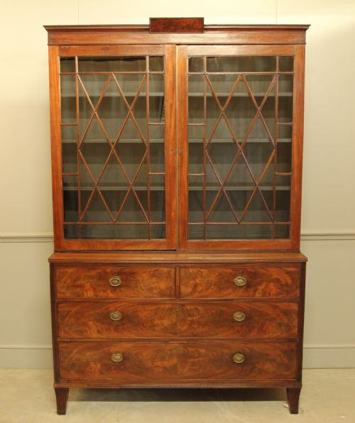 A 19th Century Mahogany Bookcase Display on Chest.