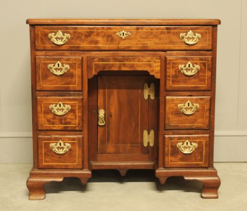 A Georgian Walnut Kneehole Desk.