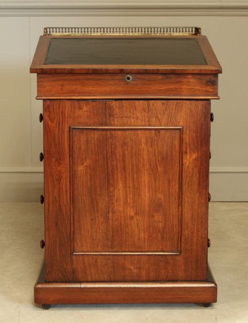 AN EARLY 19TH CENTURY ROSEWOOD DAVENPORT - ADDITIONAL PHOTO 1