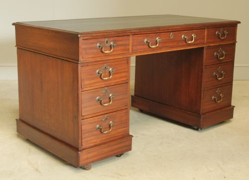 fig 1. A VICTORIAN MAHOGANY TWIN PEDESTAL DESK