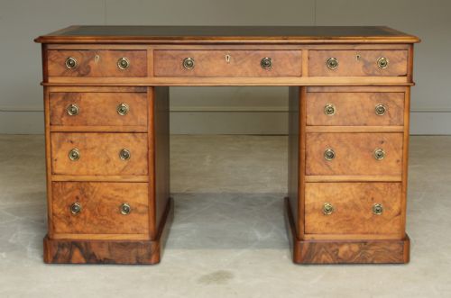 fig 1. A VICTORIAN BURR WALNUT TWIN PEDESTAL DESDK.