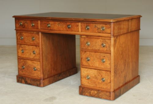fig 2. A VICTORIAN BURR WALNUT TWIN PEDESTAL DESDK.