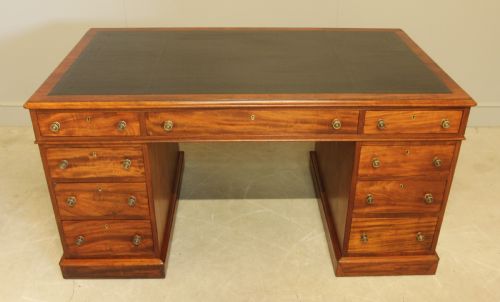 fig 1. A Maple & co mahogany directors twin pedestal desk