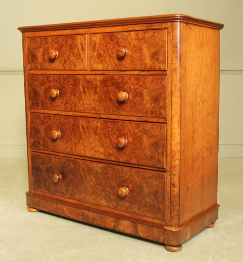 fig 2. A VICTORIAN BURR WALNUT CHEST OF DRAWERS.