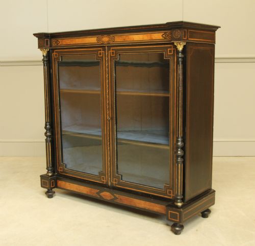 fig 1. A Victorian Ebonized two door bookcase display
