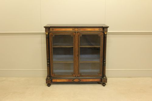 fig 2. A Victorian Ebonized two door bookcase display