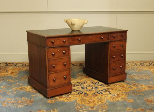 A 19th Century Victorian Oak Twin Pedestal Writing Desk.