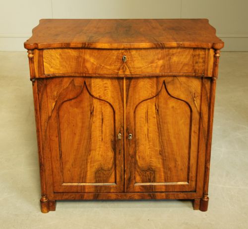fig 1. A Serpentine 19th century French Walnut two door sideboard.