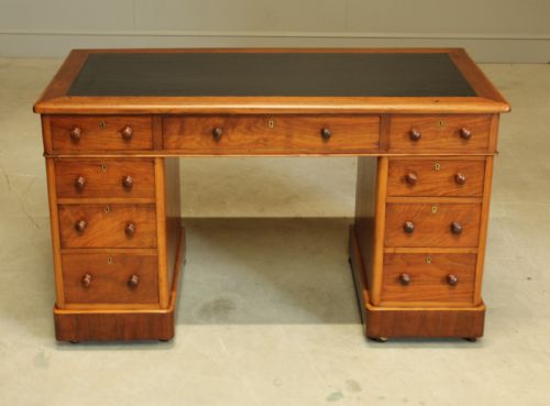 fig 1. A VICTORIAN WALNUT TWIN PEDISTAL WRITING DESK.