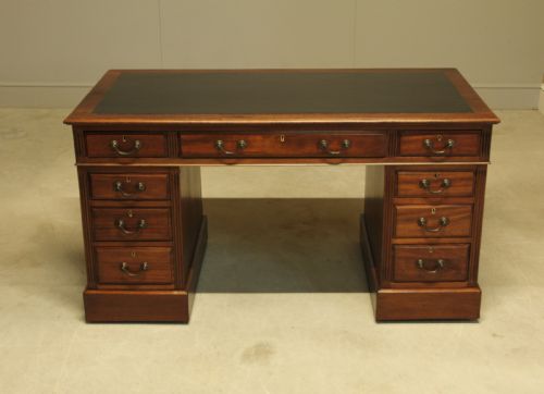 fig 1. AN EARLY 20TH CENTURY MAHOGANY TWIN PEDESTAL WRITING DESK.