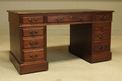 fig 2. AN EARLY 20TH CENTURY MAHOGANY TWIN PEDESTAL WRITING DESK.