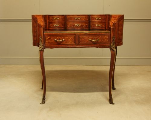 fig 1. A 19th century French Kingwood parquetry ladies desk