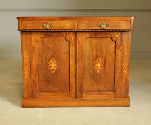 A Victorian Walnut Two Door Sideboard.
