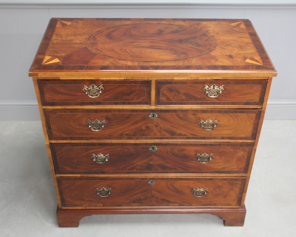 A Georgian mahogany chest of drawers  View II