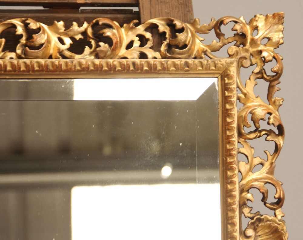 A 19th century Florentine wall mirror.  View V