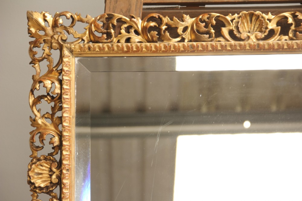 A 19th century Florentine wall mirror.  View VII