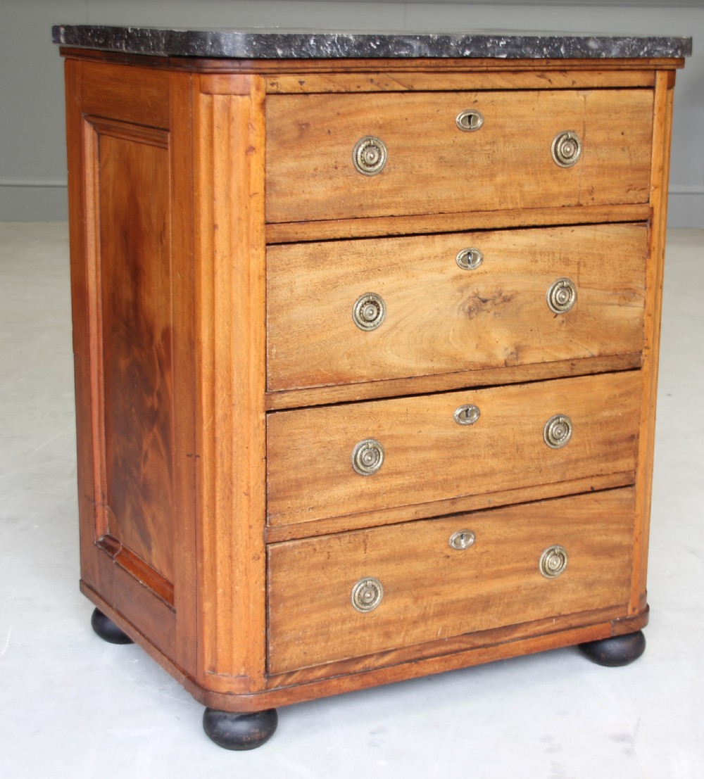 A 19th century French mahogany chest of drawers. View IV