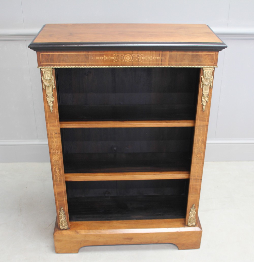 A 19th century walnut open bookcase. View II
