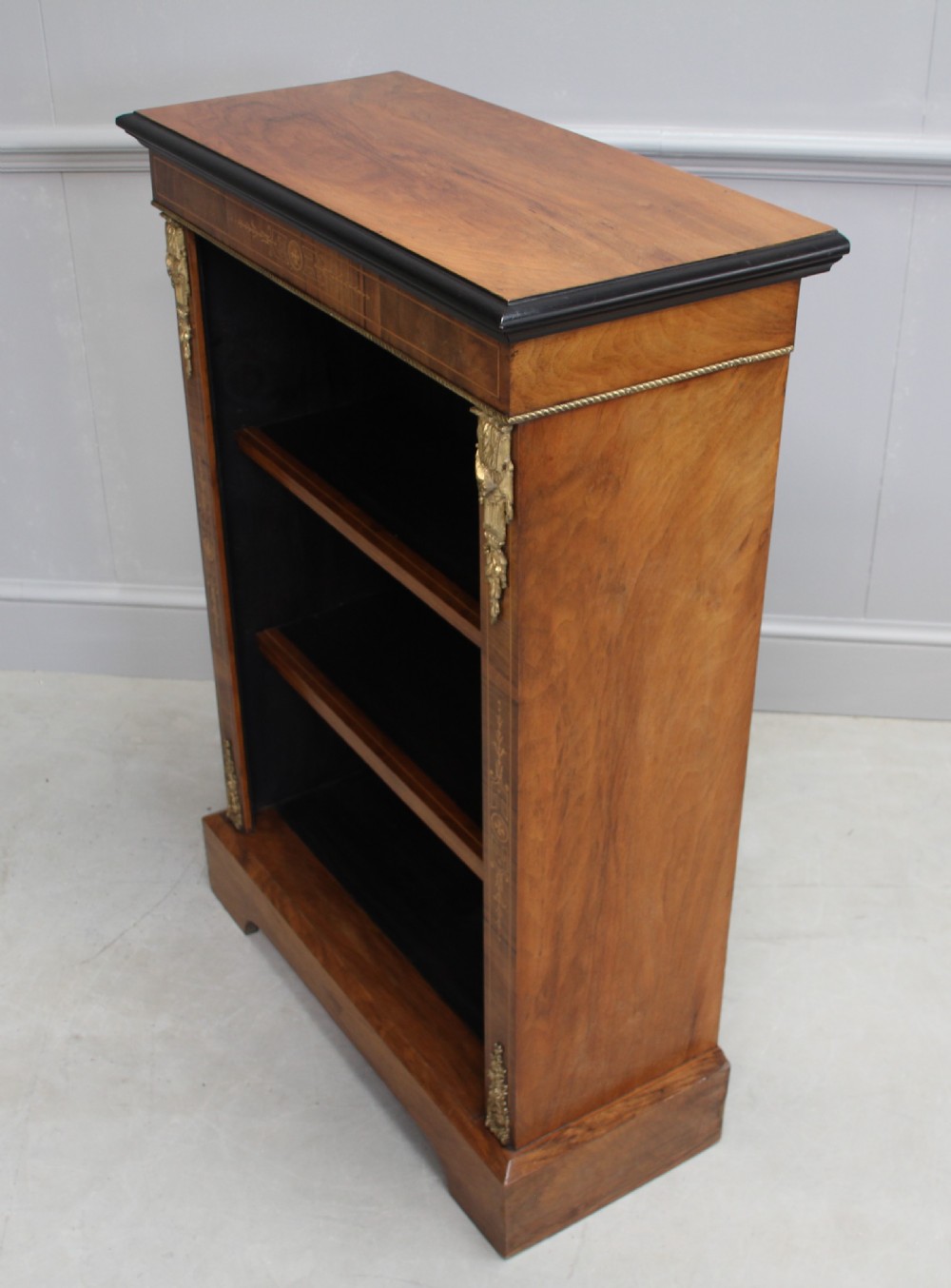A 19th century walnut open bookcase. View V