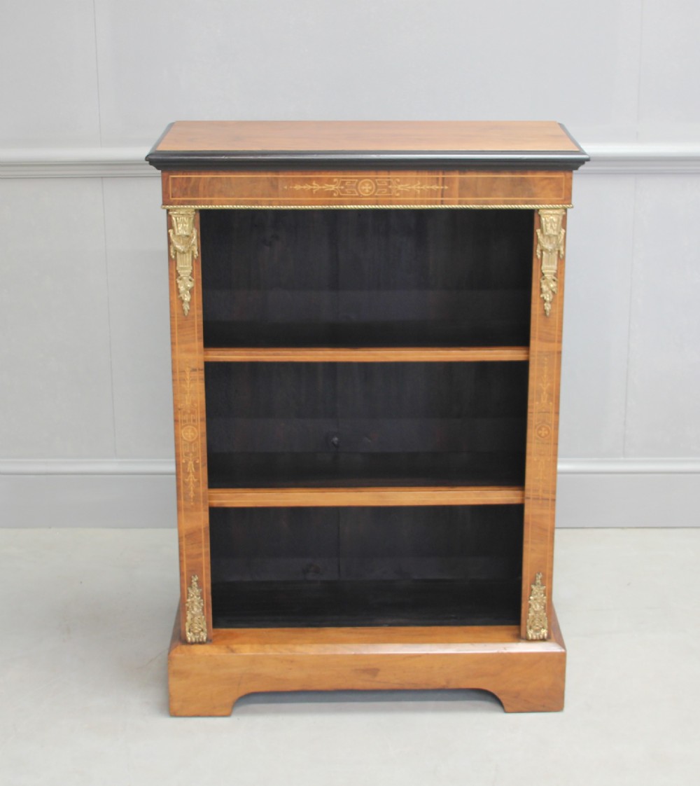 A 19th century walnut open bookcase. View VIII