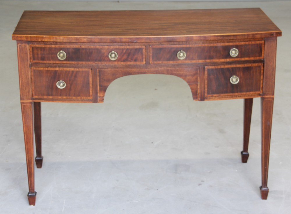 An Edwardian mahogany dressing table.