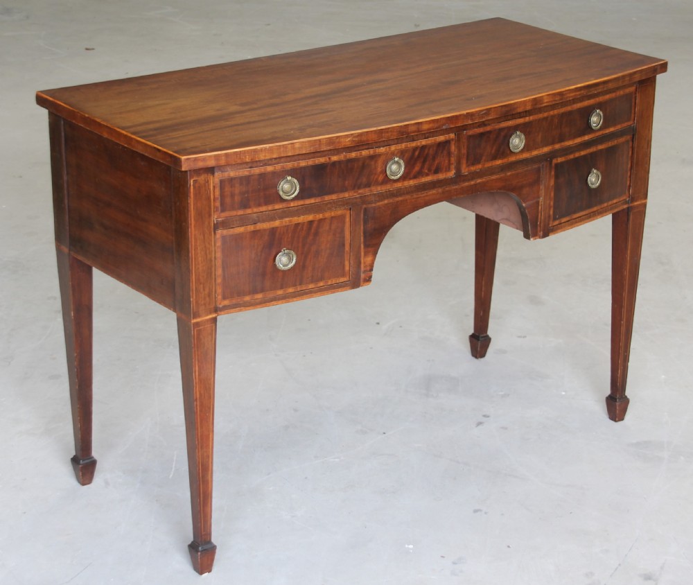 An Edwardian mahogany dressing table. View IV