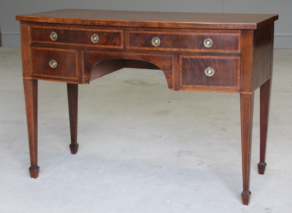 An Edwardian mahogany dressing table. View VII