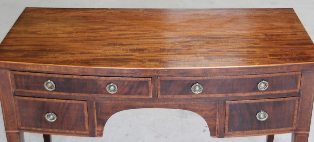 An Edwardian mahogany dressing table. View VIII