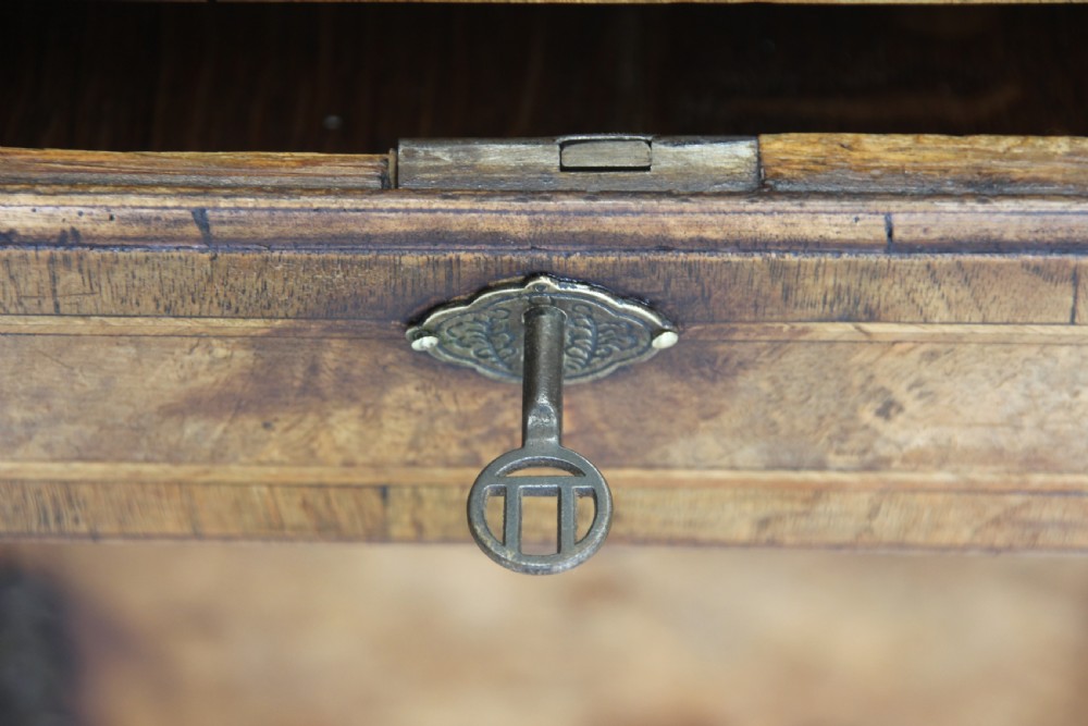 An 18th century burr walnut kneehole desk. View VII