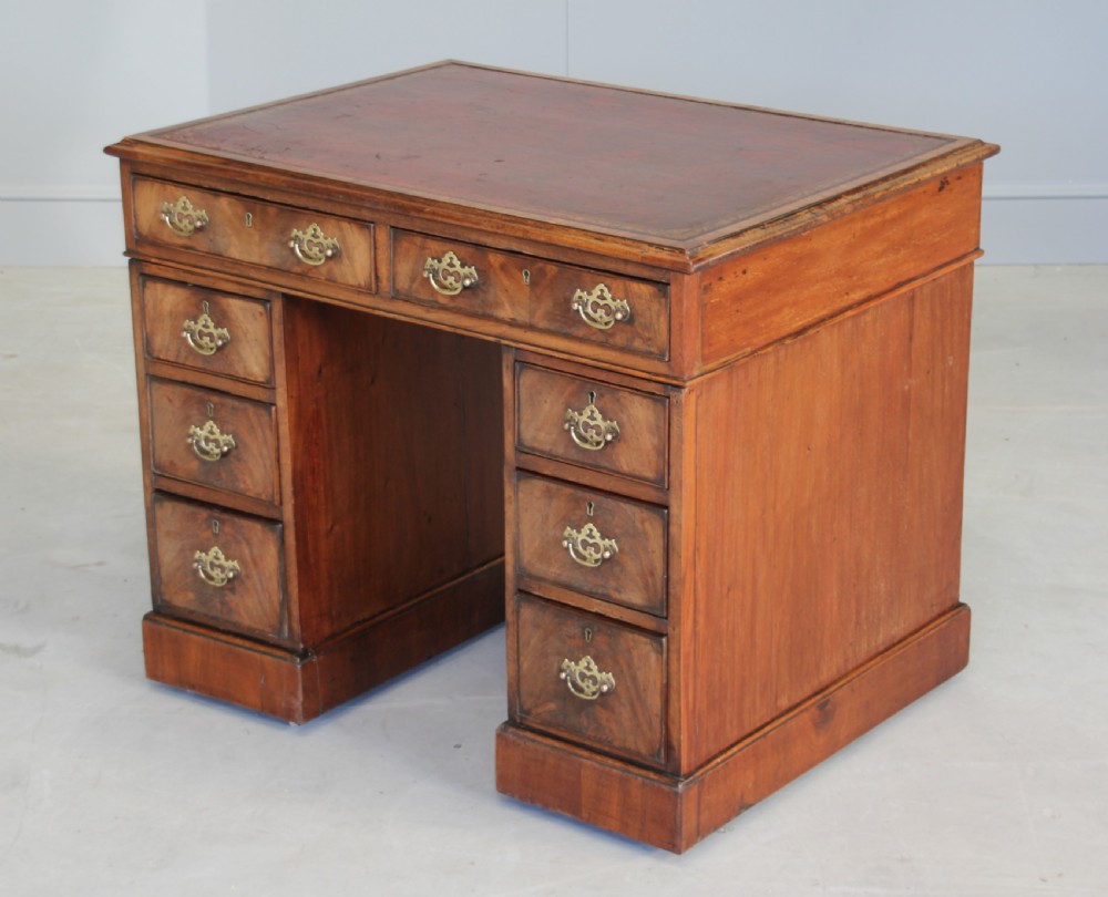 An 18th century mahogany pedestal desk.  View III
