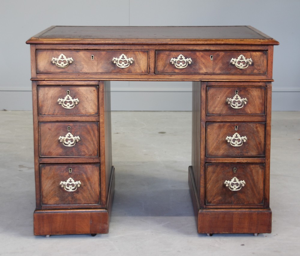 An 18th century mahogany pedestal desk.  View IV