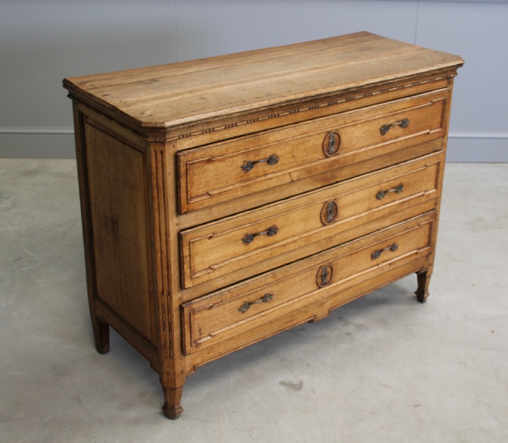 A 19th century French Oak Commode. View IV