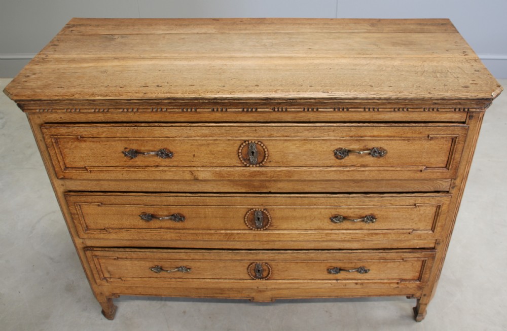 A 19th century French Oak Commode. View VIII