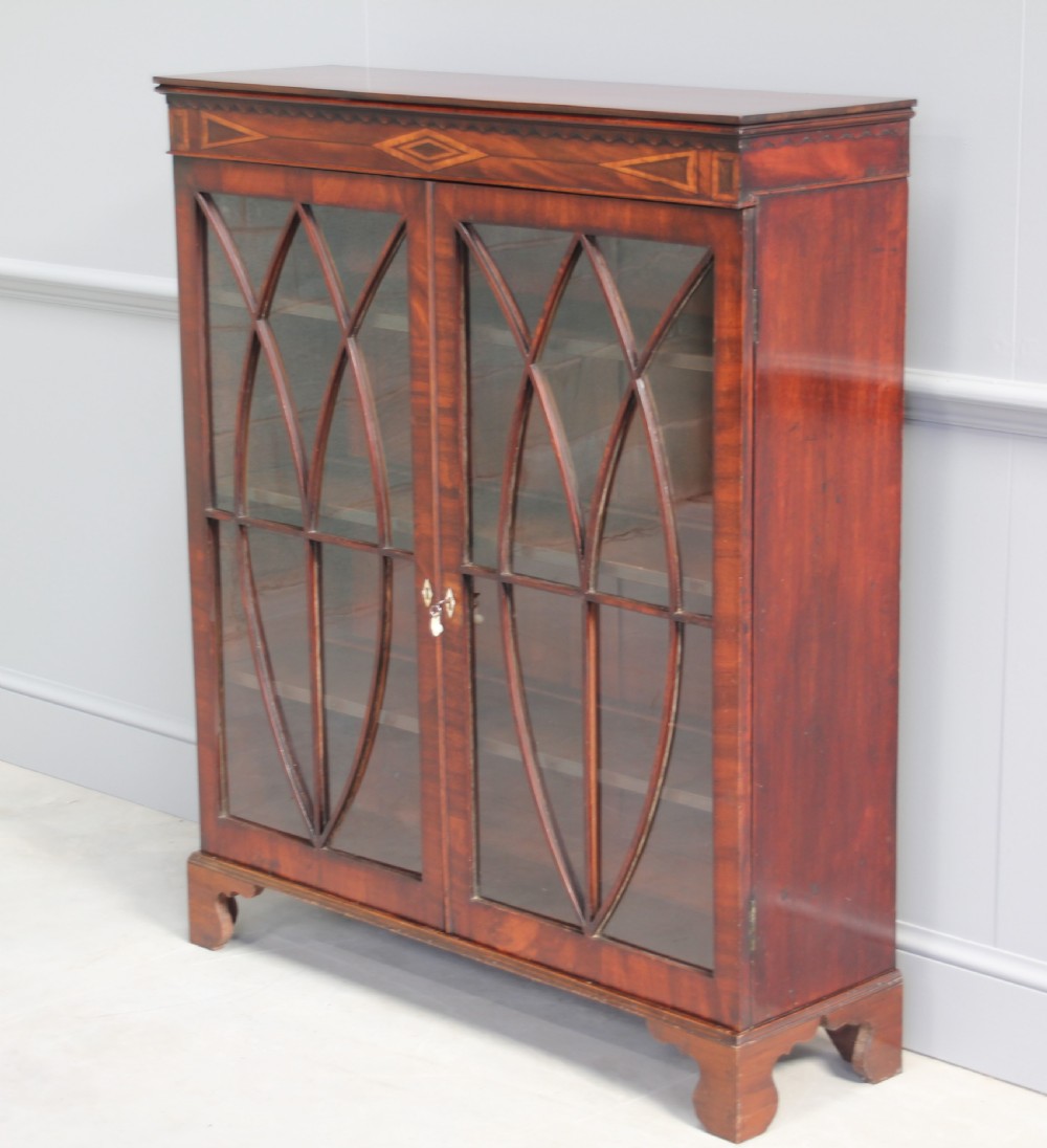 A 19th century mahogany display cabinet.