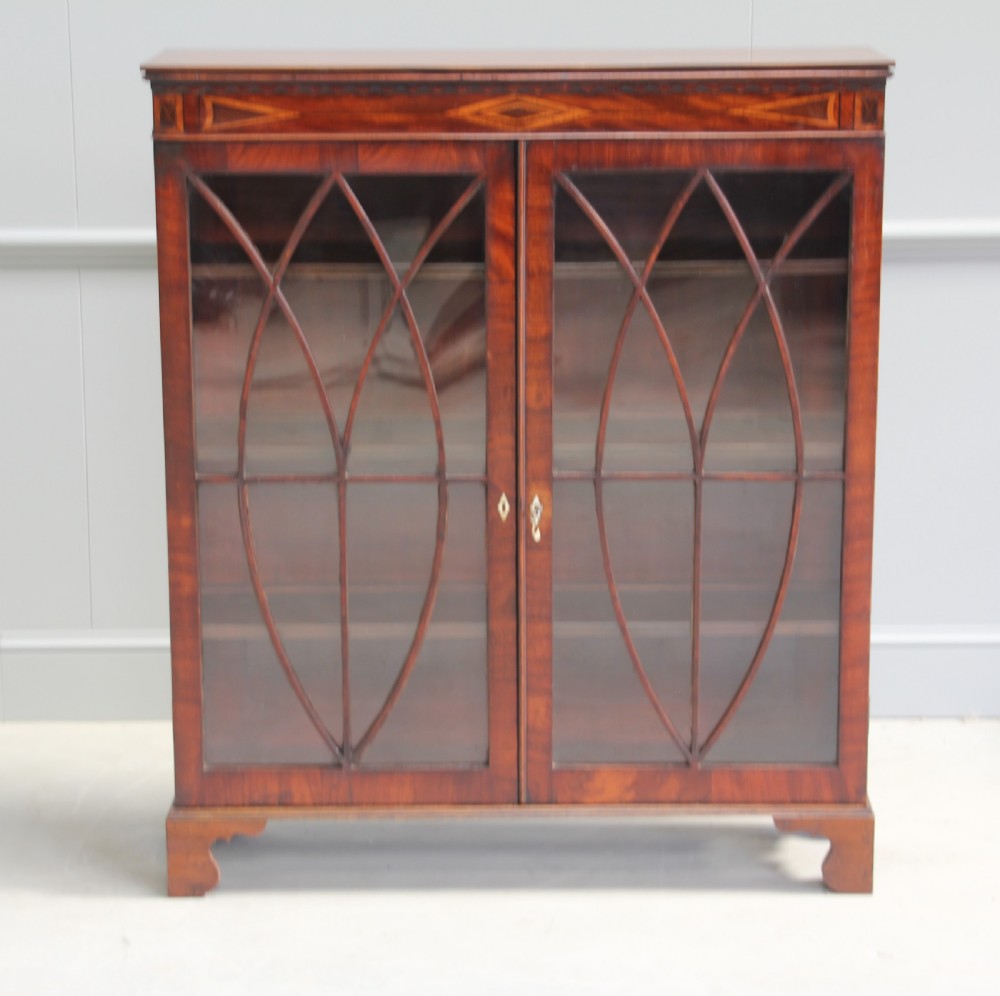 A 19th century mahogany display cabinet. View II