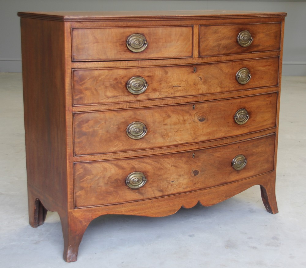 A 19th century mahogany bow fronted chest of drawers. View II