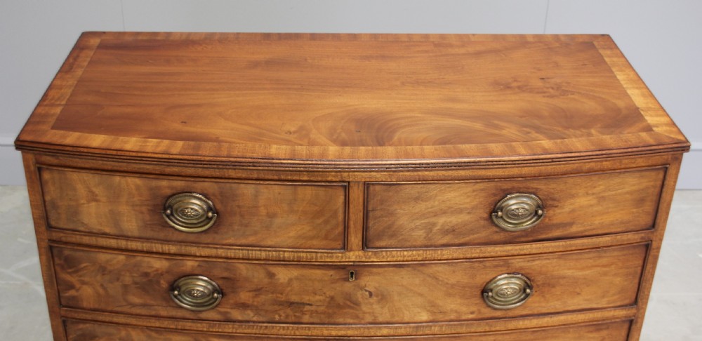 A 19th century mahogany bow fronted chest of drawers. View VIII