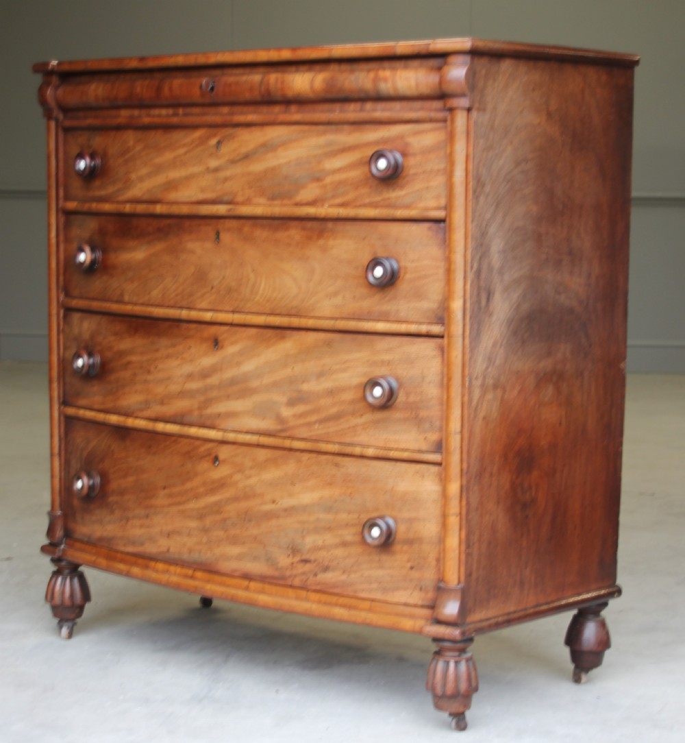 A William IV Mahogany Bow Breakfront chest of drawers View III