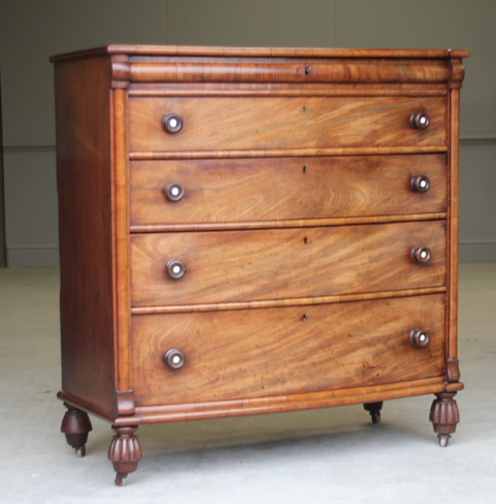 A William IV Mahogany Bow Breakfront chest of drawers View VI